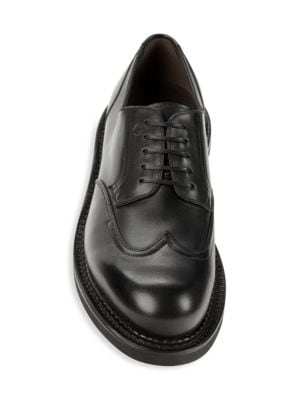 Salvatore Ferragamo
Wingtip Chunky Leather Bluchers